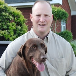 Sullivan Veterinary Clinic - Dr. Sullivan and his lab, Bell.