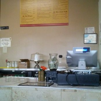 Me'Mo's Middle Eastern Cuisine - Front counter simple and clean also where the deserts are - Lebanese Near Me - Modesto, California
