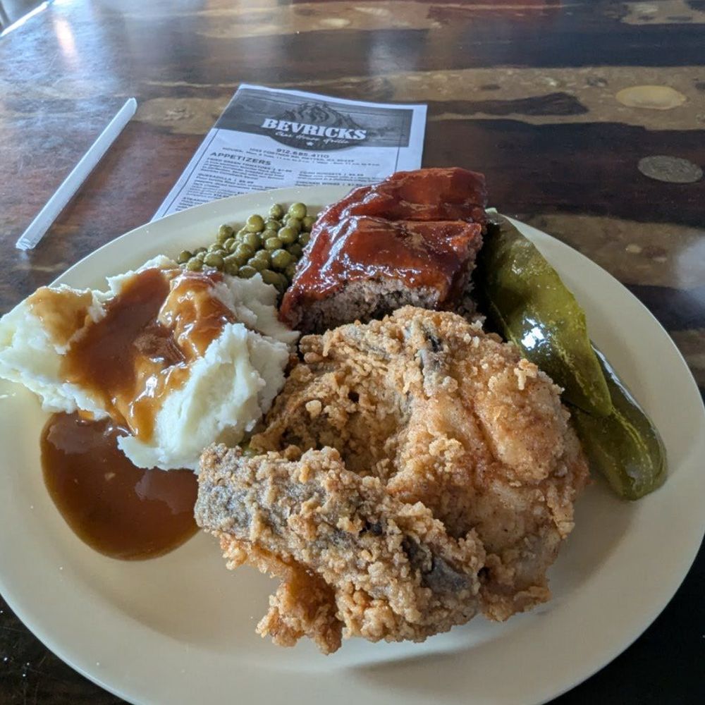 Fried chicken, mash potatoes, peas, meatloaf