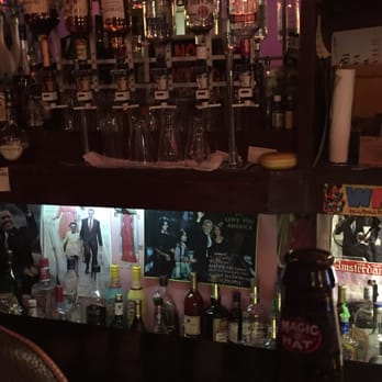 Tip Top Bar & Grill - a shelf full of liquor bottles - Dive Bars Near Me - Brooklyn, New York Tip Top Bar & Grill - a shelf full of liquor bottles - Dive Bars Near Me - Brooklyn, New York