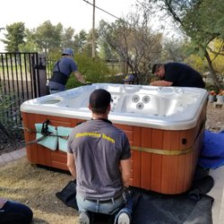 Yellow Jackets Electronics - Moving hot tub.