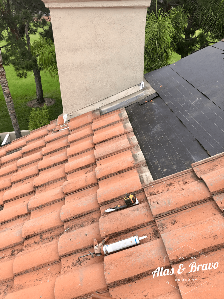 Slide of Alas & Bravo Roofing Company