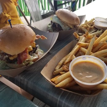 Jimmy Hula's - Aloha burger, Burnt Reyonlds, and side order of Cajun fries. - Hawaiian Near Me - Altamonte Springs, Florida Jimmy Hula's - Aloha burger, Burnt Reyonlds, and side order of Cajun fries. - Hawaiian Near Me - Altamonte Springs, Florida