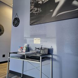 Snake Charmer Men's Body Waxing - Lobby