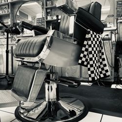 Cj's Emporium & Barbershop - A chair is waiting for you
