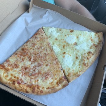 Pozzy Bros Pizza - 1 slice of cheese pizza and 1 slice of white pizza - Pizza Near Me - Rockledge, Florida Pozzy Bros Pizza - 1 slice of cheese pizza and 1 slice of white pizza - Pizza Near Me - Rockledge, Florida