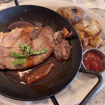 Tupelo Honey Southern Kitchen & Bar - Pork Heirloom Grits w/ Goat Cheese*** Cast Iron Pork*** - Southern Near Me - Myrtle Beach, South Carolina Tupelo Honey Southern Kitchen & Bar - Pork Heirloom Grits w/ Goat Cheese*** Cast Iron Pork*** - Southern Near Me - Myrtle Beach, South Carolina