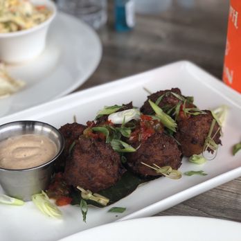 Skipper's Dockside - Conch fritters - Seafood Near Me - Key Largo, Florida Skipper's Dockside - Conch fritters - Seafood Near Me - Key Largo, Florida