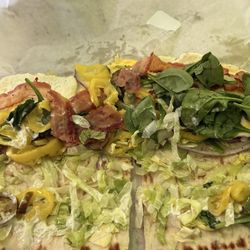 Subway - Flatbread opened up so you can see the ingredients.