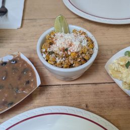 Sides, ordered separately: baked beans, elote and potato salad Sides, ordered separately: baked beans, elote and potato salad