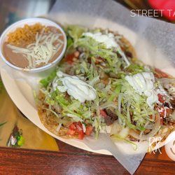 El Taco Jalisco - Lengua, shredded beef & carnitas tacos with upcharge for lettuce, tomatoes, sour cream & grilled onions (w/rice & beans)