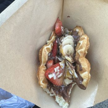 DowntownDC Holiday Market - Banana split waffle: has Nutella, banana, strawberries, almonds - Shopping Centers Near Me - Washington, DC, District of Columbia DowntownDC Holiday Market - Banana split waffle: has Nutella, banana, strawberries, almonds - Shopping Centers Near Me - Washington, DC, District of Columbia