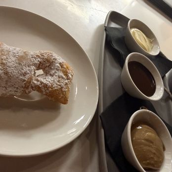 Vybe - Beignets with vanilla, chocolate, and caramel coffee sauces. - Wine Bars Near Me - Fort Myers, Florida Vybe - Beignets with vanilla, chocolate, and caramel coffee sauces. - Wine Bars Near Me - Fort Myers, Florida