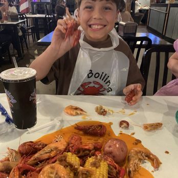 The Boiling Crab - My nephew with a crawfish! - Cajun/Creole Near Me - Sacramento, California The Boiling Crab - My nephew with a crawfish! - Cajun/Creole Near Me - Sacramento, California