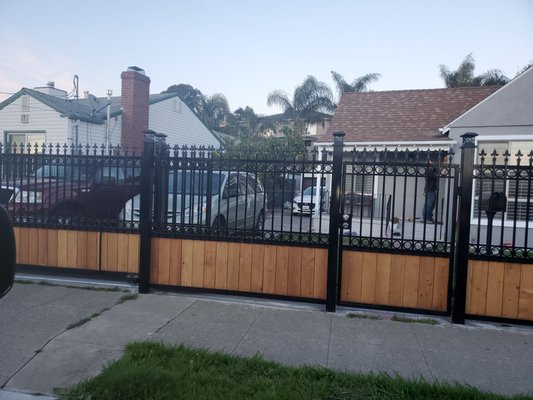 Metal and wood fence - Residential metal and wood fence Metal and wood fence - Residential metal and wood fence