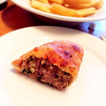 Flora's - Pork, rice and beans empanada. - Latin American Near Me - Lancaster, Pennsylvania