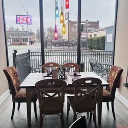 Annette’s - View facing Main Street. Outdoor Dining tables also align sidewalk.