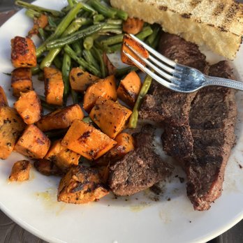 Crafted Greens - Chimichurri Grass-Fed Steak, Sweet Potatoes, Seasonal Veggies, with Carrot, Orange & Ginger Juice - American Near Me - El Cajon, California Crafted Greens - Chimichurri Grass-Fed Steak, Sweet Potatoes, Seasonal Veggies, with Carrot, Orange & Ginger Juice - American Near Me - El Cajon, California