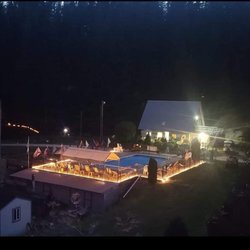 Kaniksu Ranch - This is the pool and office building. You can camp during the season.