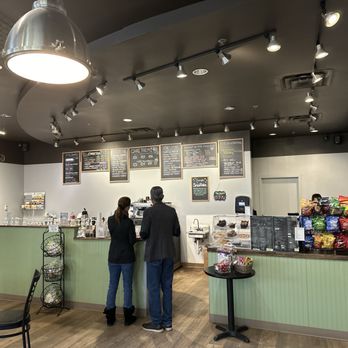 Kataluma Chai - a man and a woman standing in a coffee shop - Coffee & Tea Near Me - Broomfield, Colorado
