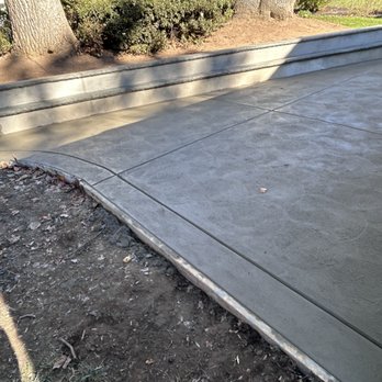 Lyons Family Construction - Patio with concrete retaining wall and columns - Masonry/Concrete Near Me