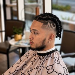 Damon’s Barber & Beauty Shop - Precision Mohawk + Custom Design  $100"