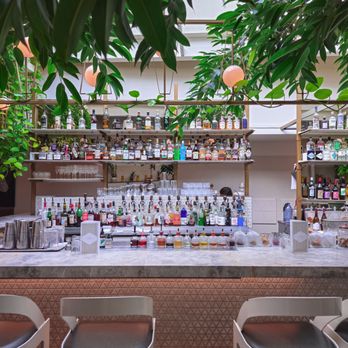 Perles et Paddock - a view of a bar - Cocktail Bars Near Me - Montreal, Quebec