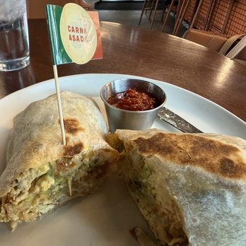Earlybird Breakfast Burritos - Eagle - Inside of my Carne asada burrito. Good stuff! Roma sauce is hot and good. Mel brought me verde sauce to try too. - Breakfast & Brunch Near Me - Eagle, Idaho Earlybird Breakfast Burritos - Eagle - Inside of my Carne asada burrito. Good stuff! Roma sauce is hot and good. Mel brought me verde sauce to try too. - Breakfast & Brunch Near Me - Eagle, Idaho