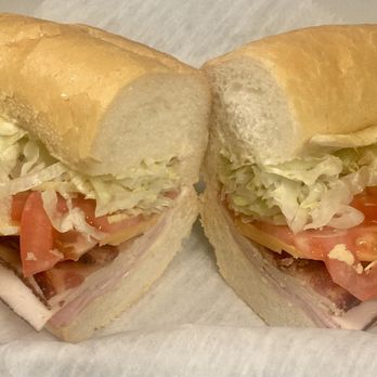 Causeway Cafe - Club Sandwich with ham, turkey, bacon, cheddar, lettuce, tomato and mayo on Dong Phuong pistolette - Sandwiches Near Me - Metairie, Louisiana Causeway Cafe - Club Sandwich with ham, turkey, bacon, cheddar, lettuce, tomato and mayo on Dong Phuong pistolette - Sandwiches Near Me - Metairie, Louisiana