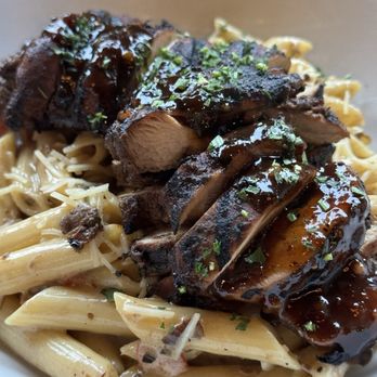 Bacchanal Junction - Rasta paste with jerk chicken - Bars Near Me - Bloomfield, New Jersey