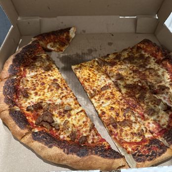 Santino's Pizza & Grinders - Their version of crispy. - Pizza Near Me - Pace, Florida Santino's Pizza & Grinders - Their version of crispy. - Pizza Near Me - Pace, Florida