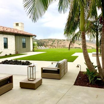 My Botanica - a view of a backyard with palm trees - Landscaping Near Me - Laguna Beach, California My Botanica - a view of a backyard with palm trees - Landscaping Near Me - Laguna Beach, California