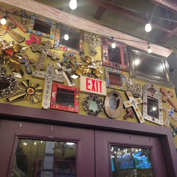 Cantina Louie - Mirrors and Mexican folk art crosses above the entryway of Cantina Louie. - Mexican Near Me - West Melbourne, Florida Cantina Louie - Mirrors and Mexican folk art crosses above the entryway of Cantina Louie. - Mexican Near Me - West Melbourne, Florida