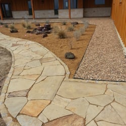 BNB Stone - Oklahoma Flagstone walk-way with Decomposed Granite beds, and Native River Rock.