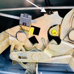 Greenwood Ford Service - Arrow points to the dealer-installed zip tie on the 1997 F150 3rd door.