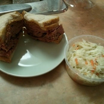 Wolfies - Montreal smoked meat sandwich with small coleslaw to go. - Delis Near Me - North York, Ontario Wolfies - Montreal smoked meat sandwich with small coleslaw to go. - Delis Near Me - North York, Ontario