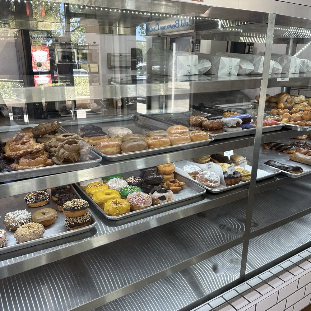 Delicious Donuts and Bagels - Display towards the end of the day - Donuts Near Me - Newark, California Delicious Donuts and Bagels - Display towards the end of the day - Donuts Near Me - Newark, California