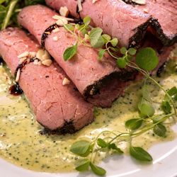 Covinten Cafe - Chilled Beef à la Riviera - Chilled ,finely sliced roast beef with a bright green grape and almond sauce, finished with fresh herbs.