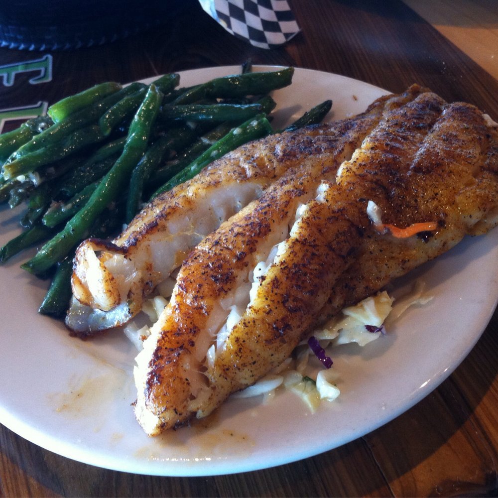 The Reef - Gulf Grouper served atop orange ginger slaw with green beans on the side. - Seafood Near Me - Biloxi, Mississippi The Reef - Gulf Grouper served atop orange ginger slaw with green beans on the side. - Seafood Near Me - Biloxi, Mississippi