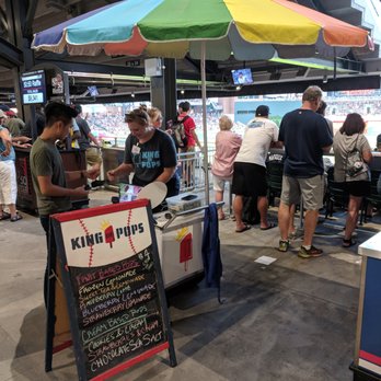 King of Pops - King of Pops cart and umbrella behind Section 134. - Food Stands Near Me - Atlanta, Georgia King of Pops - King of Pops cart and umbrella behind Section 134. - Food Stands Near Me - Atlanta, Georgia