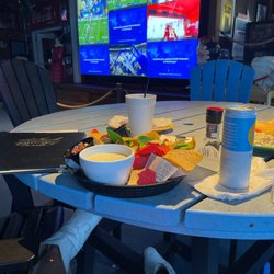 TV screens, chips with cheese dip a& drink!