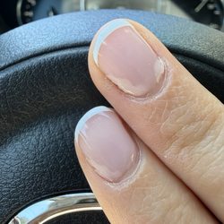 Top Coat Nail Studio - Gel paint beginning separation from nail after 4 days from manicure.