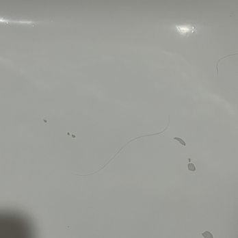 Humphreys Half Moon Inn - Hair in bathtub and tile peeling apart - San Diego, CA