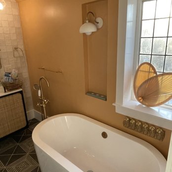 Regal Property Services - a bathtub in a bathroom - General Contractors Near Me Regal Property Services - a bathtub in a bathroom - General Contractors Near Me