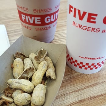 Five Guys - Peanuts and drinks while waiting. - Burgers Near Me - Schaumburg, Illinois Five Guys - Peanuts and drinks while waiting. - Burgers Near Me - Schaumburg, Illinois
