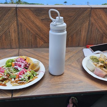 Shaka Tacoz - Sitting on the outside deck, the 3-taco plate (left) was delicious, as was the meat-filled quesadilla (right). Both were very filling. - Mexican Near Me - Captain Cook, Hawaii
