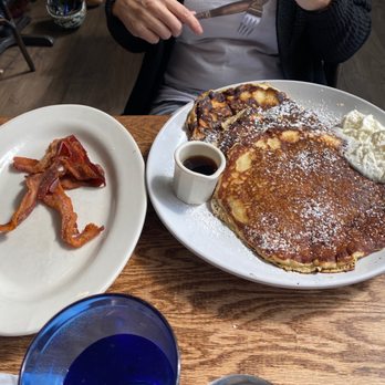 Winkel - Buttermilk Pancakes & powdered sugar. Side of bacon - Breakfast & Brunch Near Me - Philadelphia, Pennsylvania