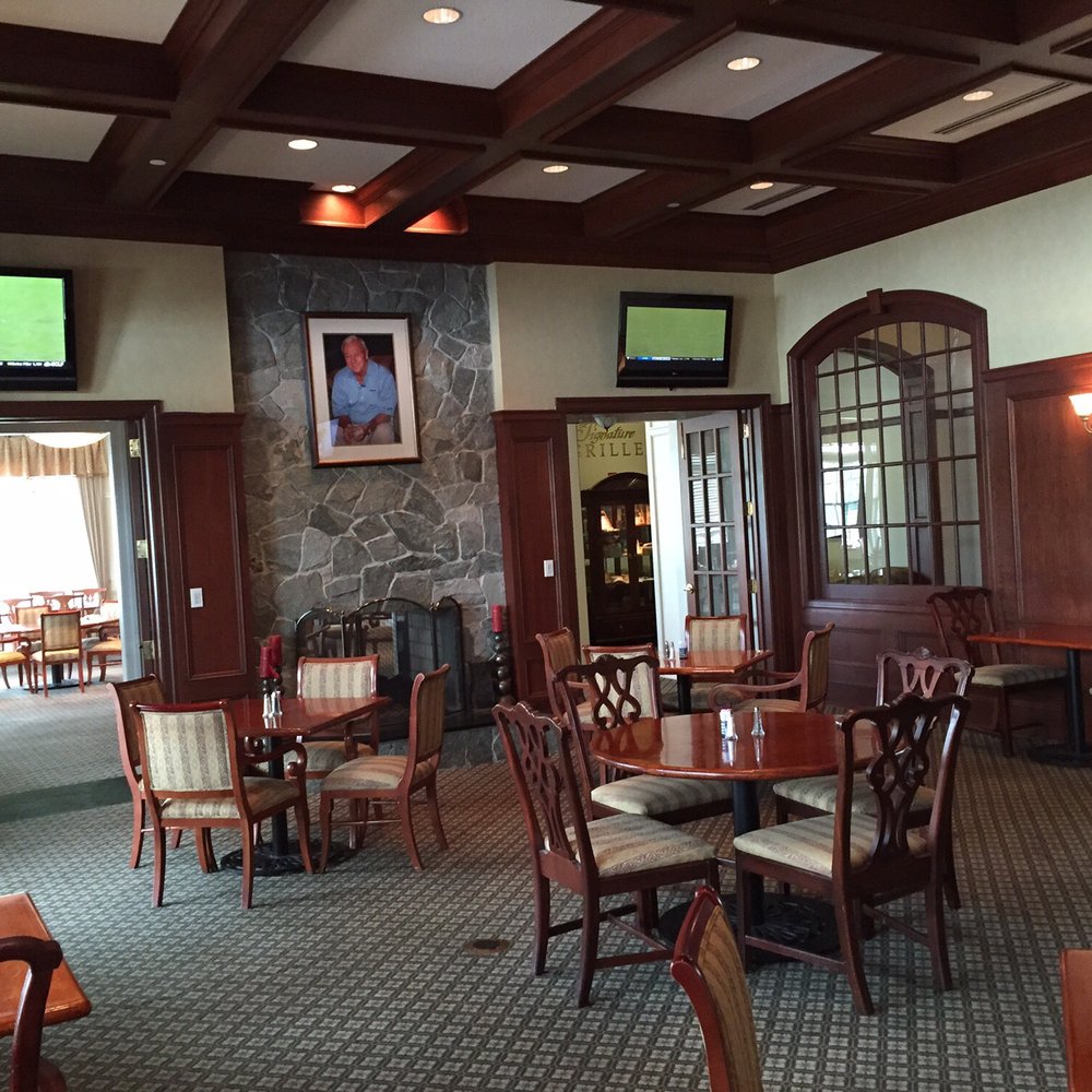 Signature Grille - a dining room with tables and chairs - Bars Near Me - Virginia Beach, Virginia Signature Grille - a dining room with tables and chairs - Bars Near Me - Virginia Beach, Virginia