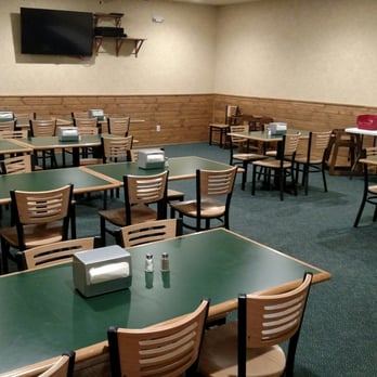 Monicals Pizza - empty tables and chairs in a restaurant - Pizza Near Me - El Paso, Illinois