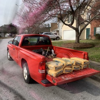 Grandpa Handyman - the back end of a red pickup truck - Handyman Near Me Grandpa Handyman - the back end of a red pickup truck - Handyman Near Me